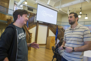 From left, senior Ryan Frappier and alumnus Miroslav Lukic '10 talk at the Computer and Mathematical Sciences department networking lunch in Dorsey Gym. (Photo by Kaci Smart)